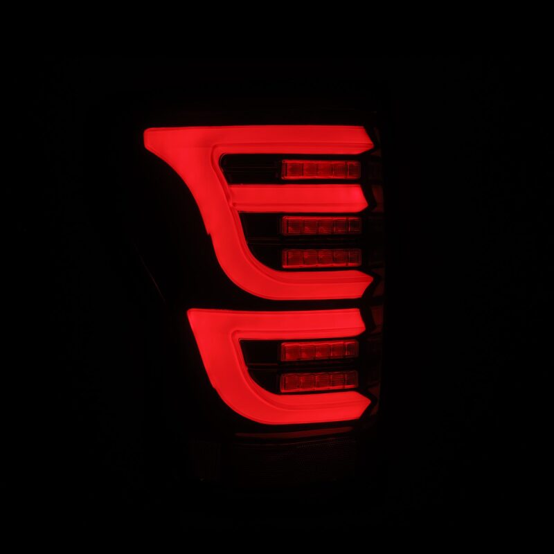 AlphaRex LUXX-Series LED tail lights for 07-13 Toyota Tundra in black and red, showcasing a sleek, modern design.