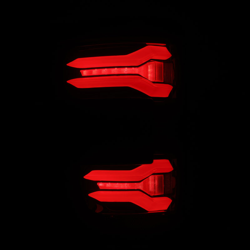 AlphaRex LUXX LED taillights for 21-23 Ford F-150 in black and red, featuring a sleek design with BLIS technology.