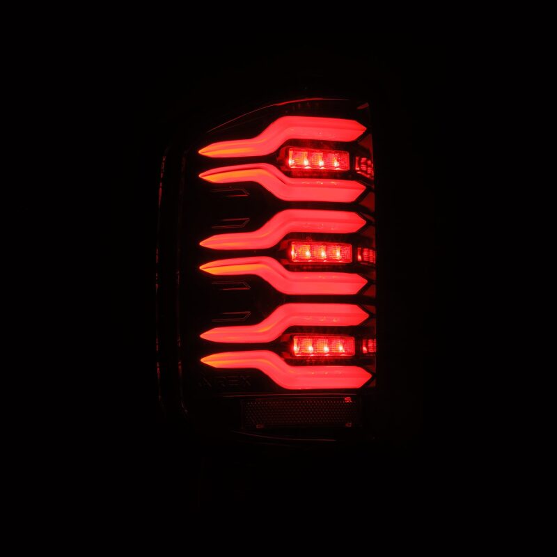 AlphaRex Luxx-Series LED tail lights for 14-18 Chevy Silverado 1500 in alpha-black with sequential signals.