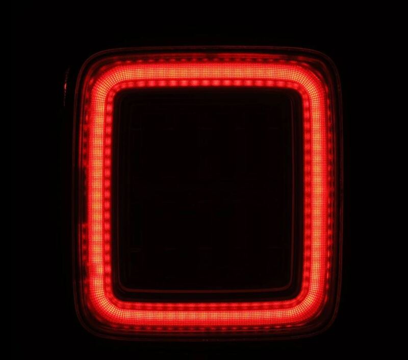 AlphaRex NOVA-Series LED tail light for 2018-2024 Jeep Wrangler JL, featuring a sleek design and bright red illumination.
