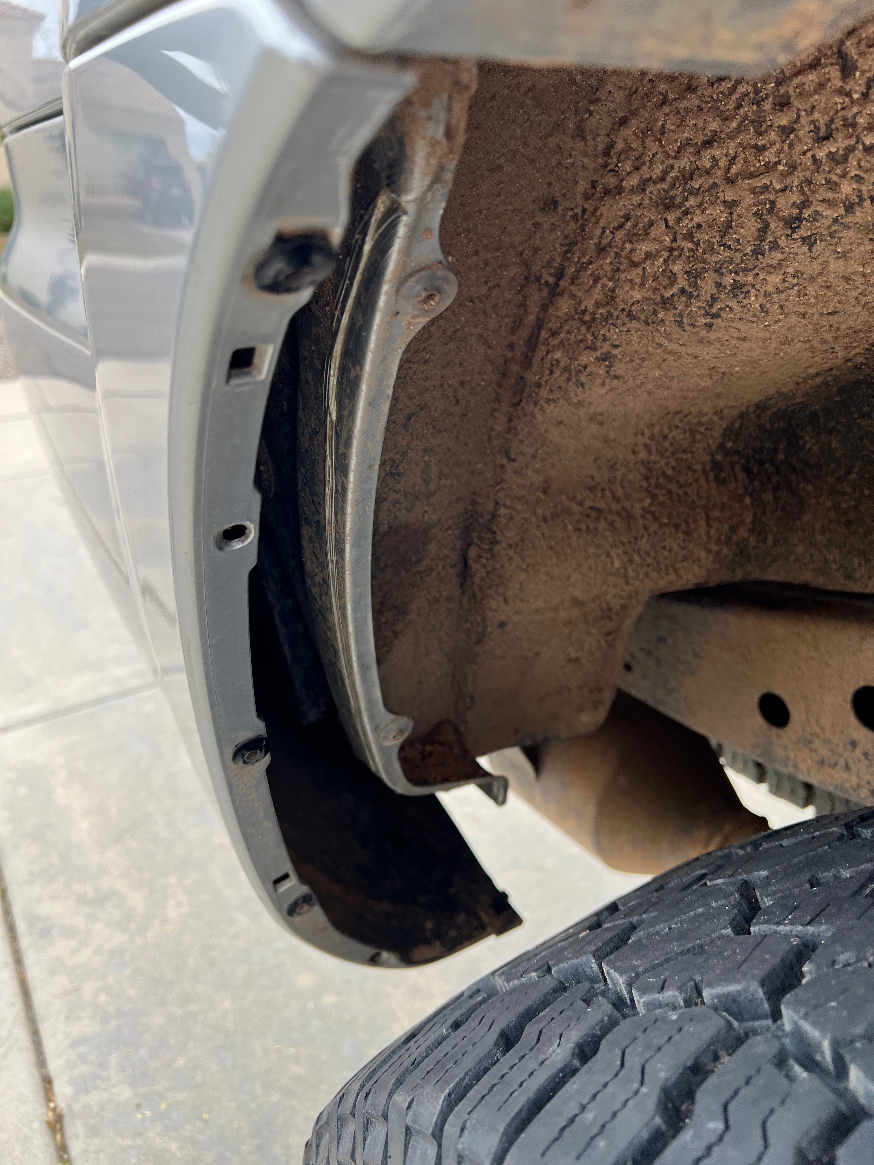 Mud flap deletes and gap fillers for 2002-2005 Toyota 4Runner, showcasing installation area and tire clearance.