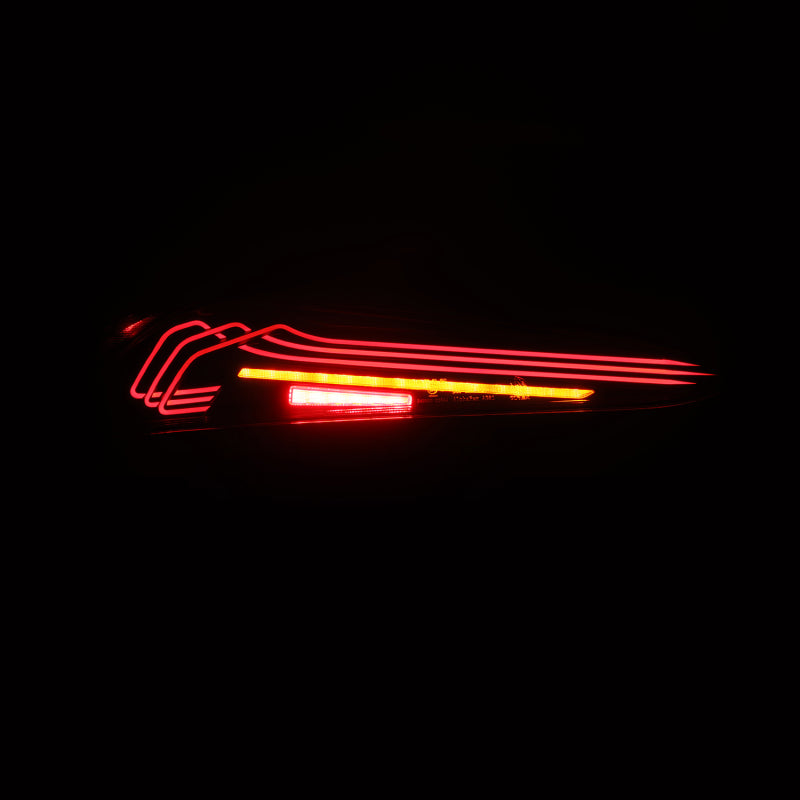 AlphaRex LUXX-Series LED tail lights for 20-24 Toyota Supra, featuring a sleek black design and distinctive laser style illumination.