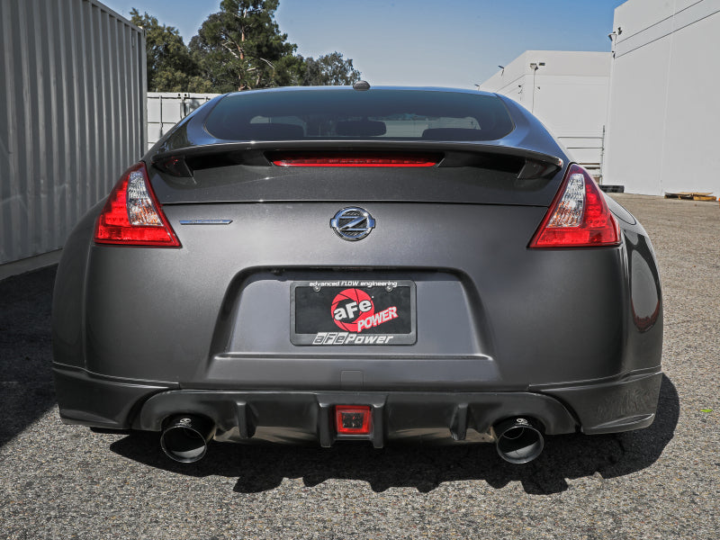 Afe Takeda Cat-Back Exhaust System installed on a Nissan 370Z, showcasing dual exhaust tips and sleek rear design.