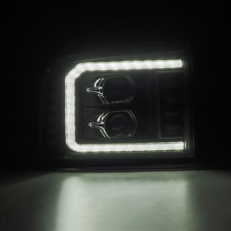 AlphaRex LUXX LED projector headlights for 05-07 Ford Super Duty with sequential signal and daytime running lights.