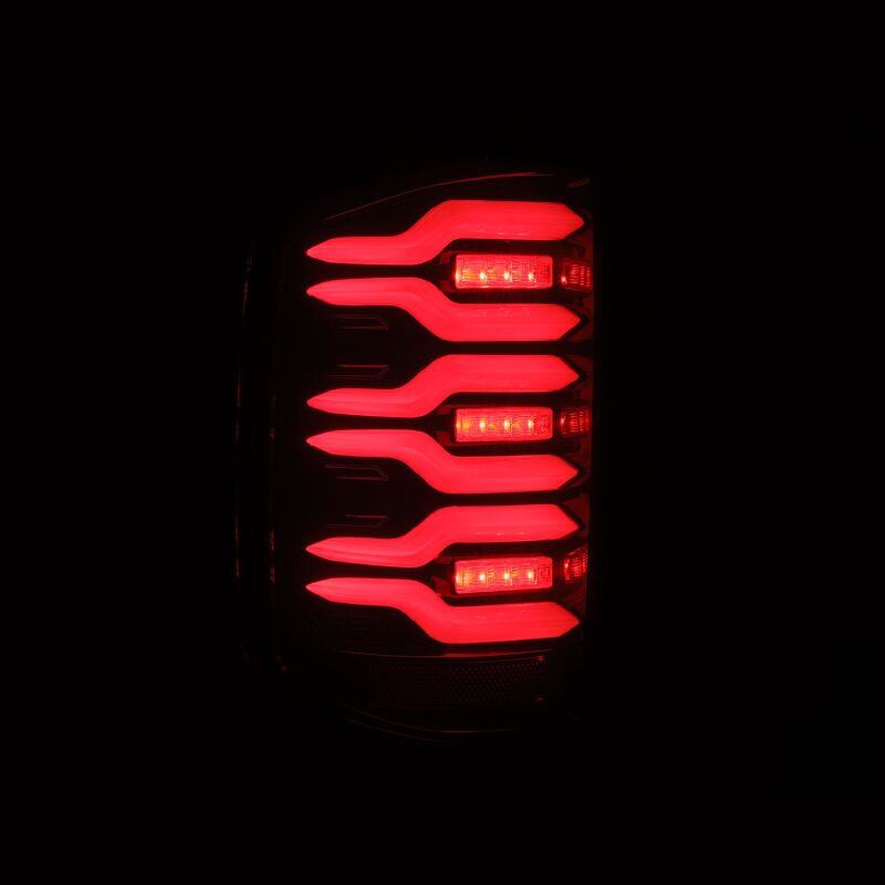 AlphaRex Luxx-Series LED tail lights for 14-18 Chevy Silverado 1500 in black and red with sequential signals.