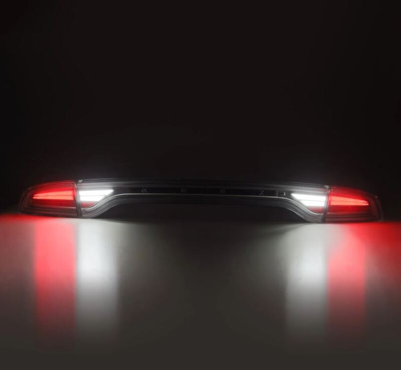 AlphaRex 15-23 Dodge Charger Nova-Series LED tail lights in Alpha-Black, featuring sleek design and bright illumination.