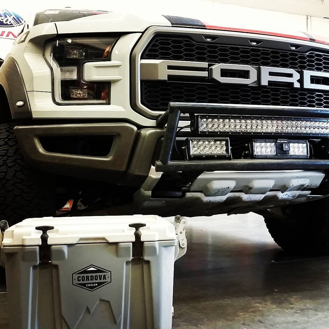 Ford Raptor front bumper light bar mount kit for 2017-2020 models, showcasing rugged design and off-road capability.