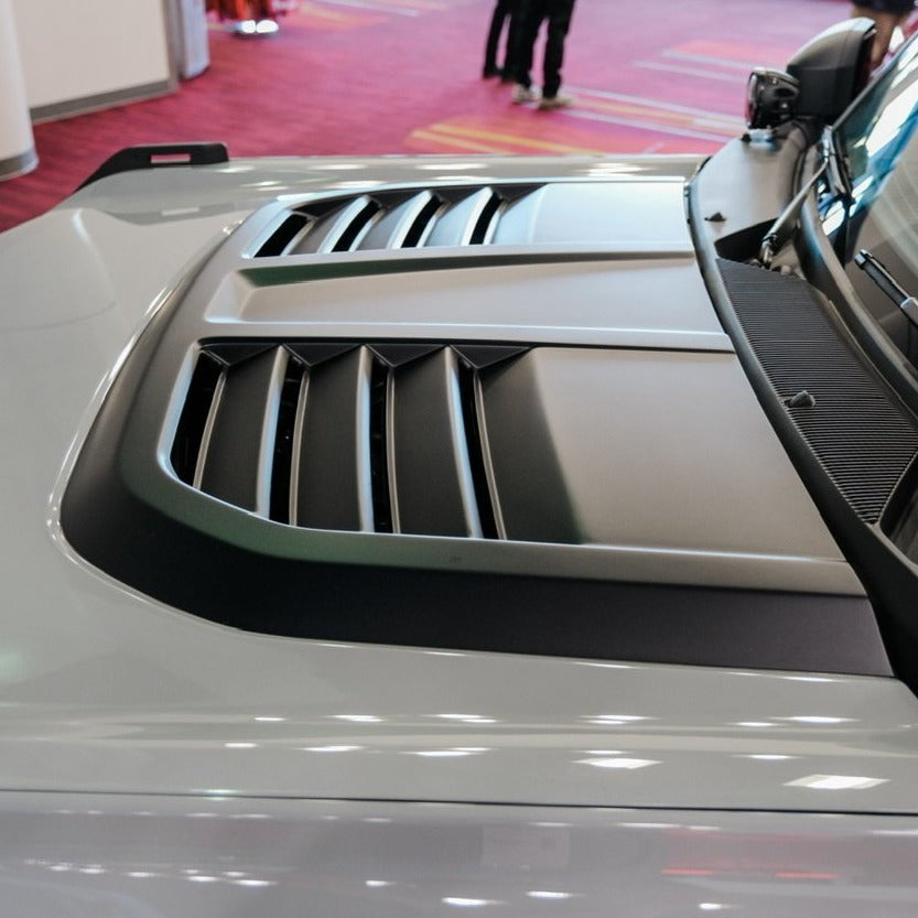 2021-2025 Ford Bronco heat extractor hood showcasing sleek design and functional vents for improved engine cooling.