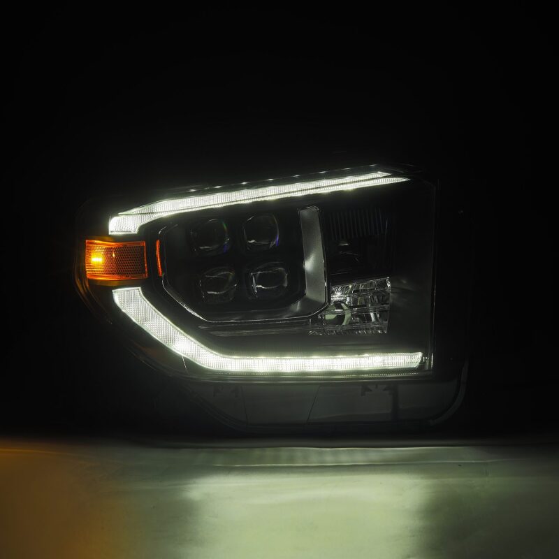 AlphaRex NOVA-Series LED projector headlights for 14-21 Toyota Tundra in black with sequential signals and daytime running lights.