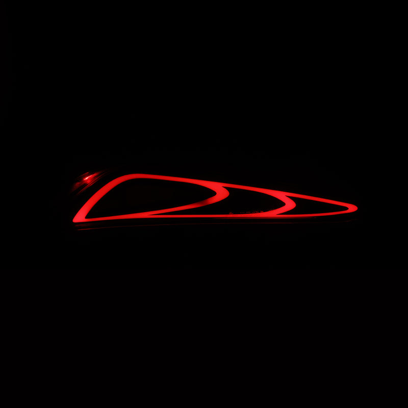 AlphaRex LUXX-Series FT-1 Style LED tail lights for 20-24 Toyota Supra in black with a sleek red illumination design.