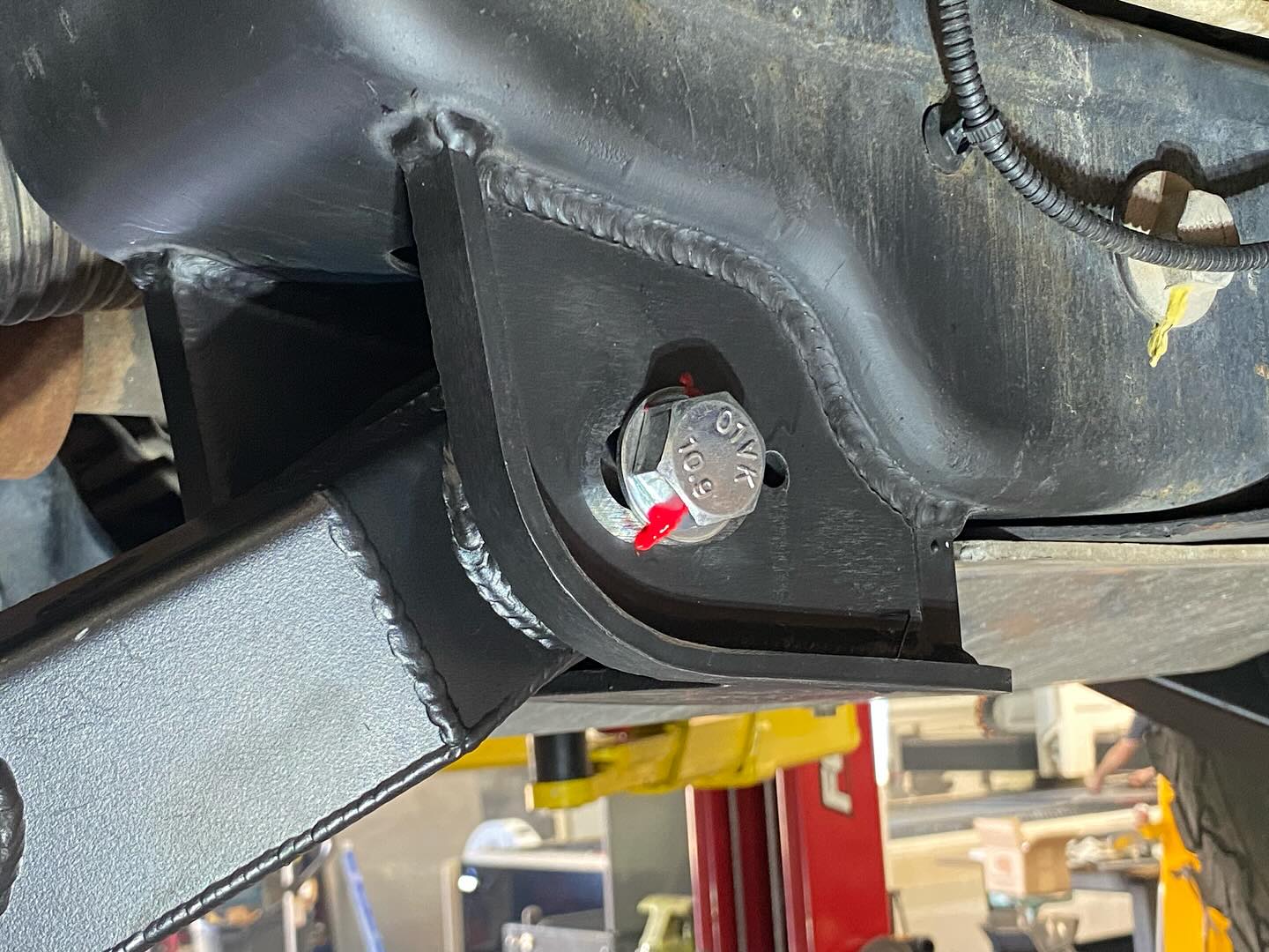 2017-2024 Raptor lower arm pocket replacement kit by Foutz Motorsports, showcasing a detailed view of the installation.