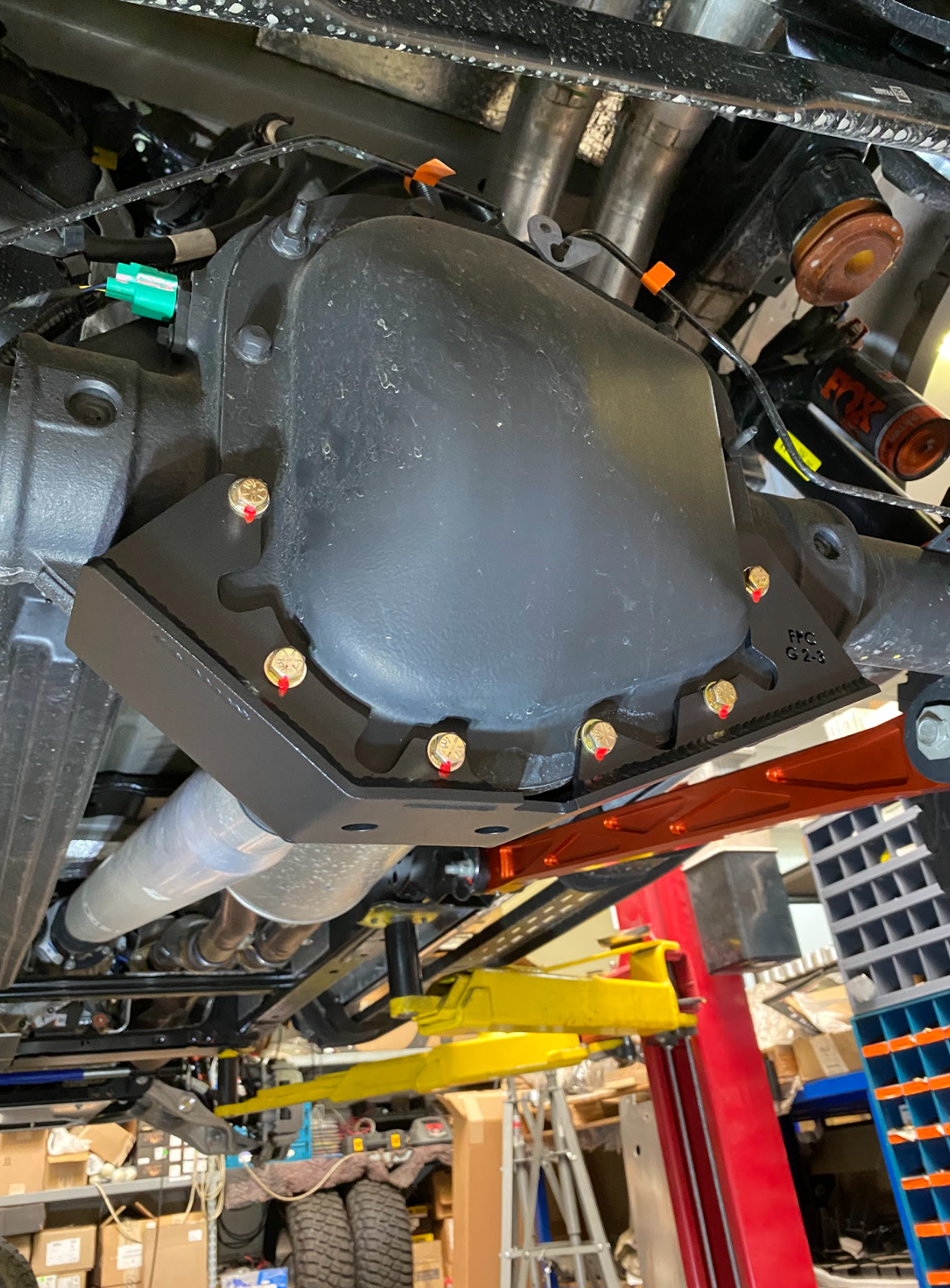 Rear differential skid plate kit for 2017-2024 Raptor, showcasing durable protection under the vehicle.