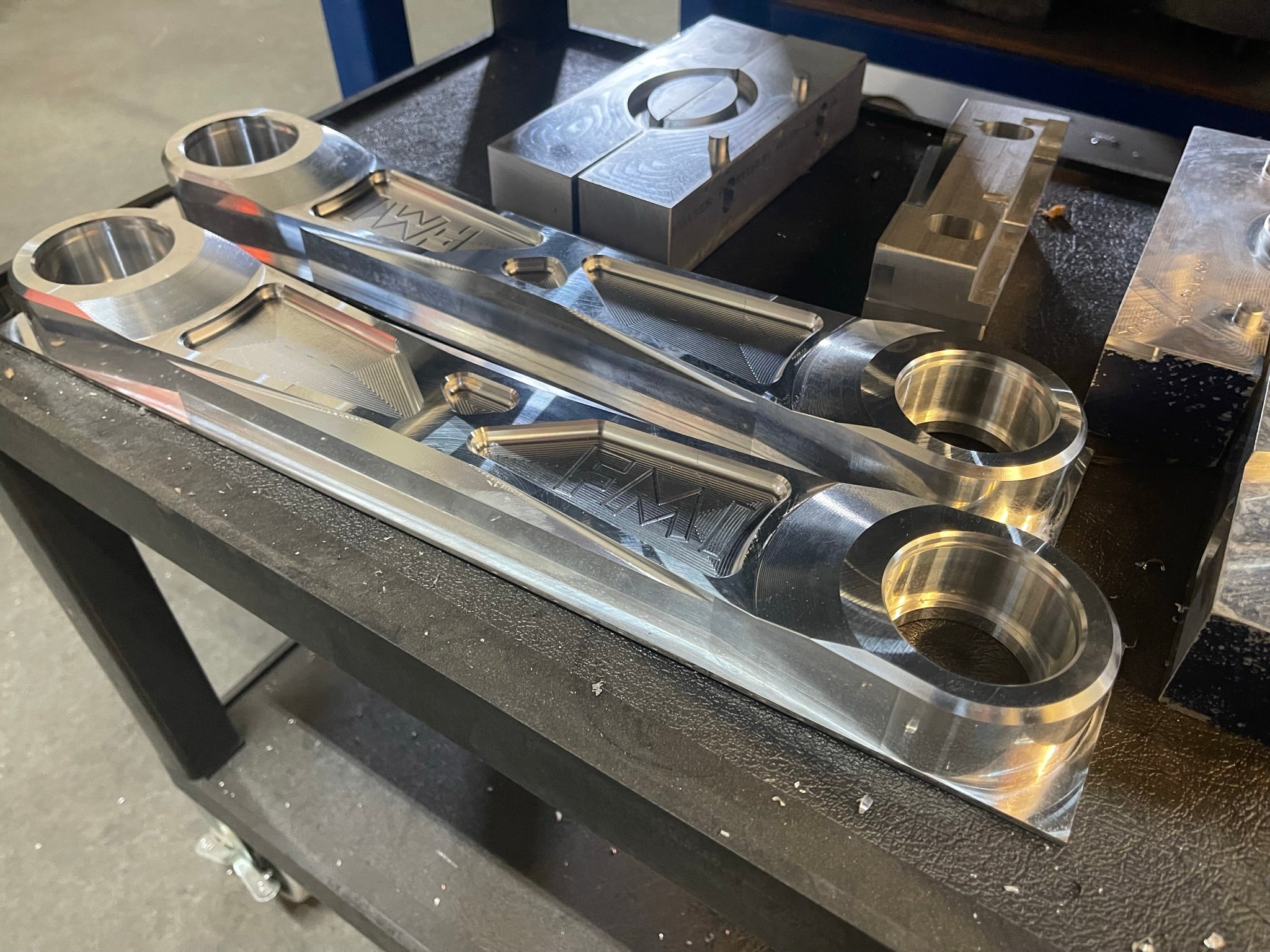 Billet aluminum rear suspension arms for Bronco, showcasing precision engineering and robust design for offroad performance.