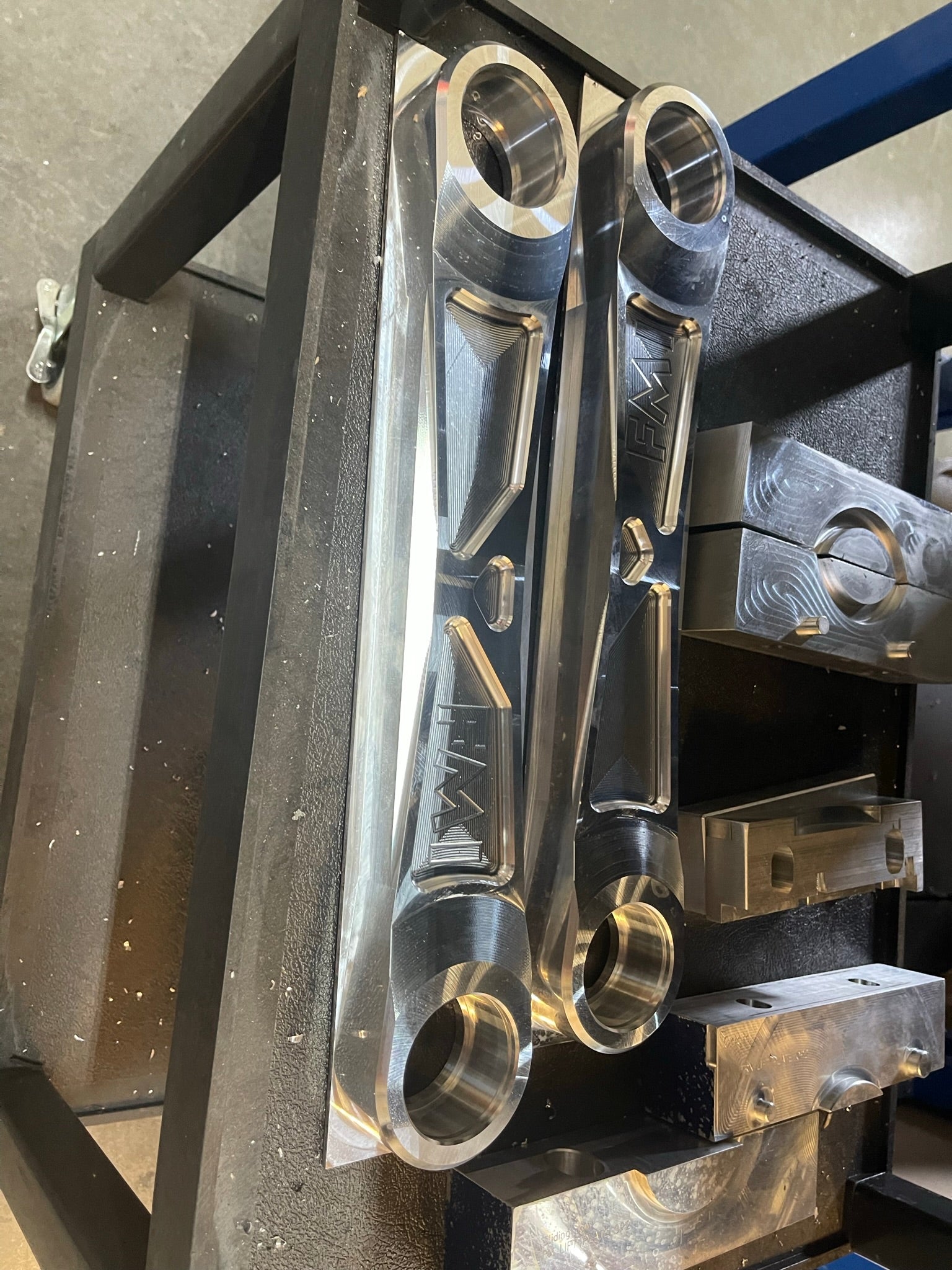 Billet aluminum rear suspension arms for Bronco, showcasing precision engineering and durability for offroad performance.