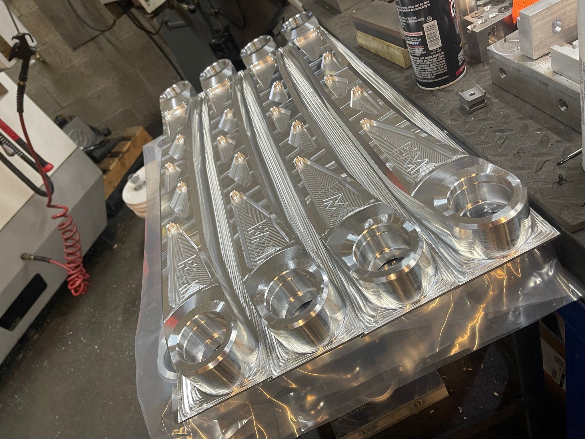 Billet aluminum rear suspension arms for Bronco, showcasing precision engineering and durability for offroad performance.