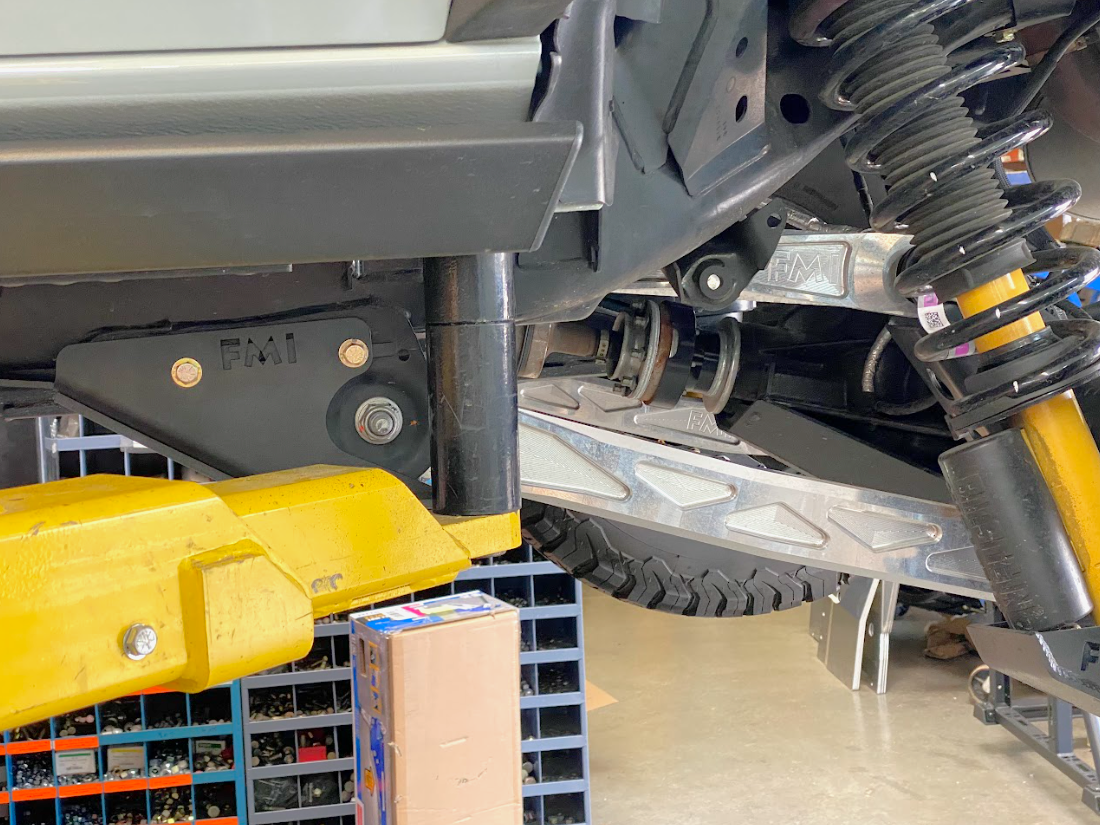 2021 and up Bronco rear lower arm frame guard with HDPE slide installed, showcasing durability and off-road capability.