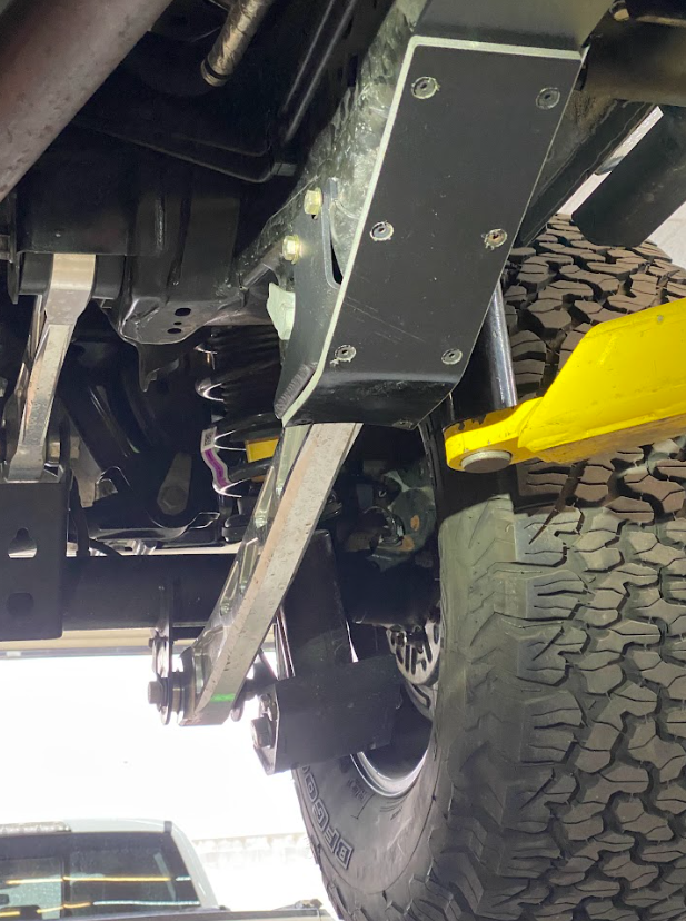 2021 and up Bronco rear lower arm frame guard with HDPE slide installed, showcasing durability and offroad protection.