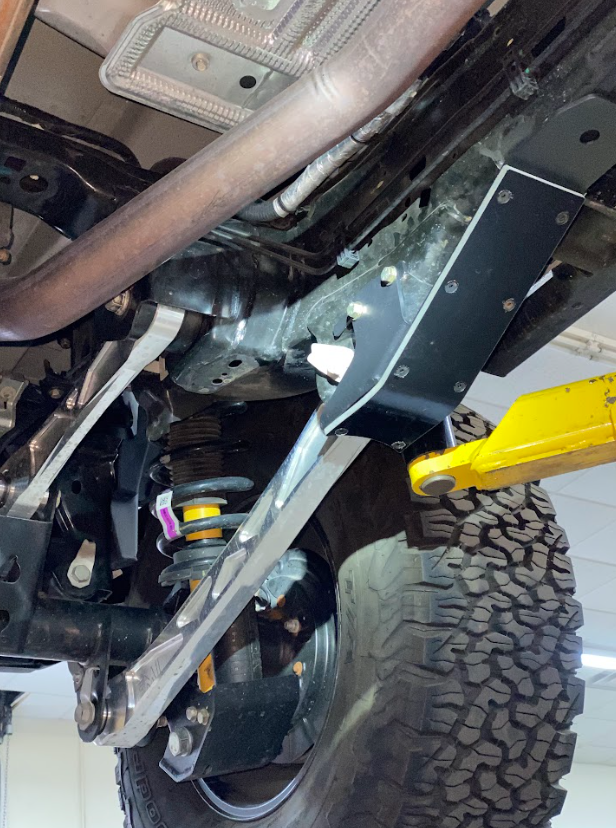 2021 and up Bronco rear lower arm frame guard with HDPE slide, showcasing durable protection and off-road readiness.
