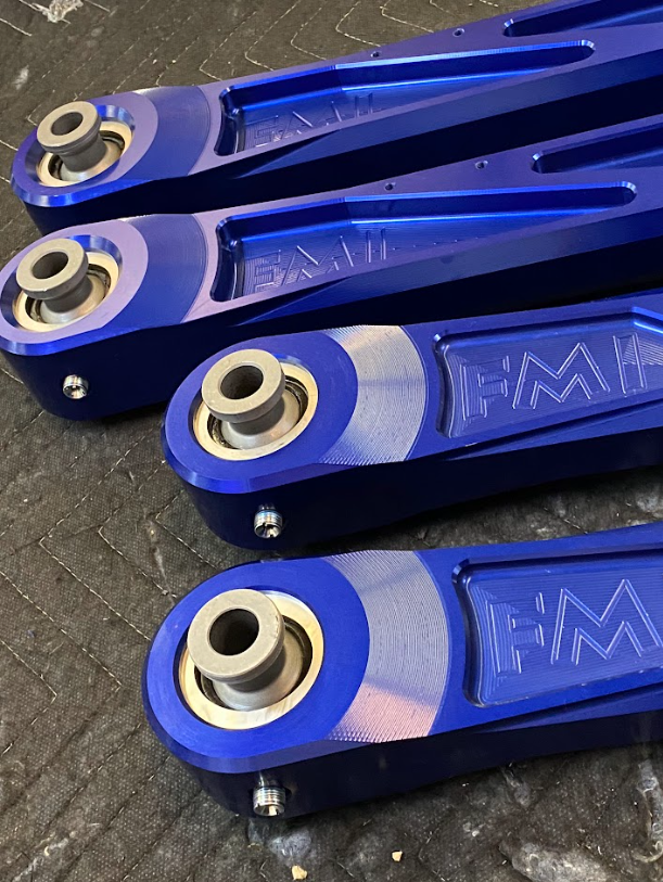 2024 Ranger Raptor rear suspension kit featuring billet aluminum arms with ultra-flex joints in blue finish.