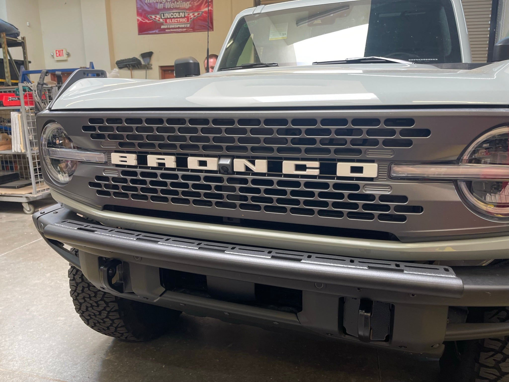 Front view of a 2022 Ford Bronco Raptor showcasing the light mount kit, designed for versatile light installation.