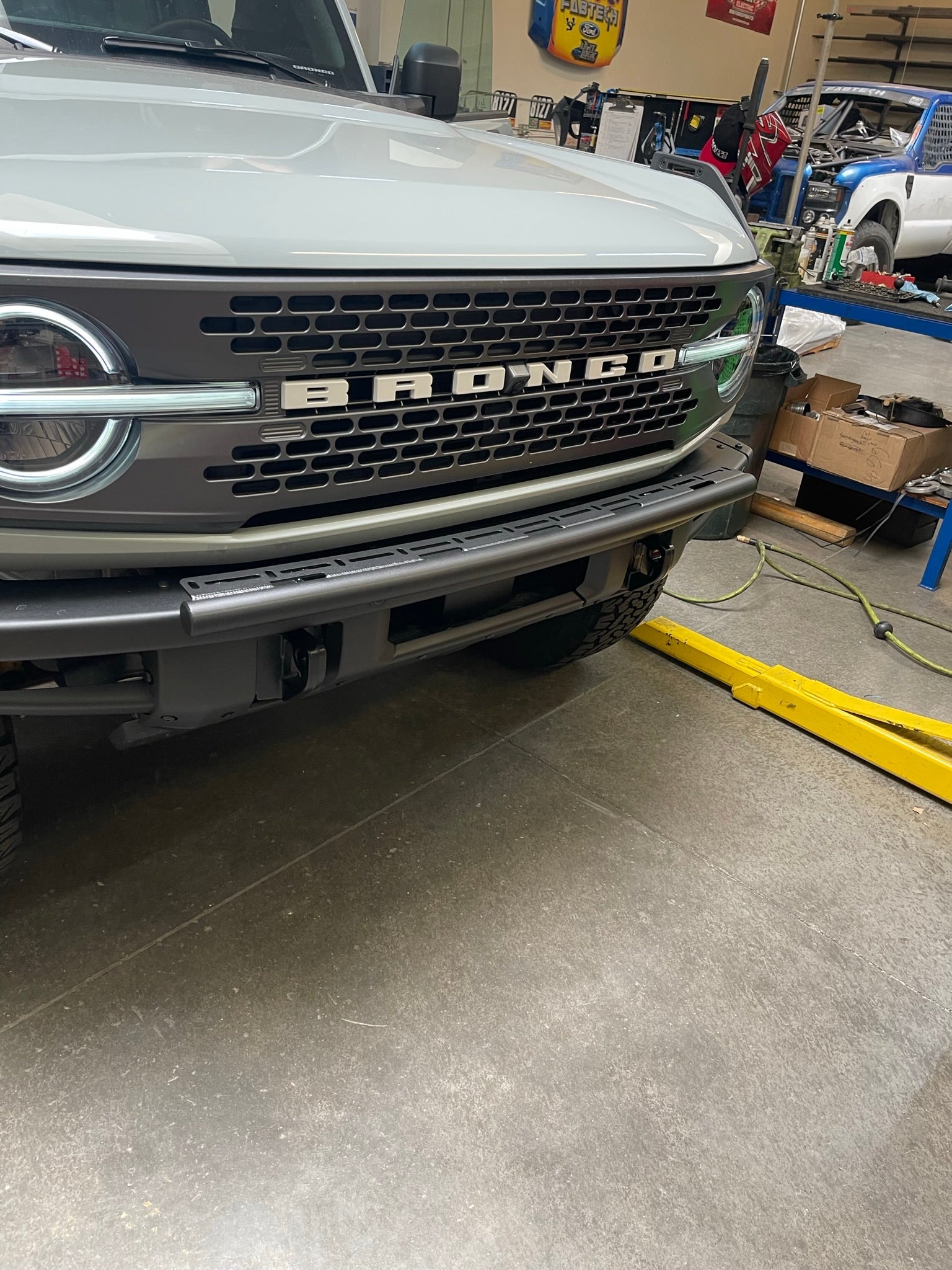 6th Gen Bronco front light mount kit installed on a modular stock bumper, showcasing versatility for any light type.