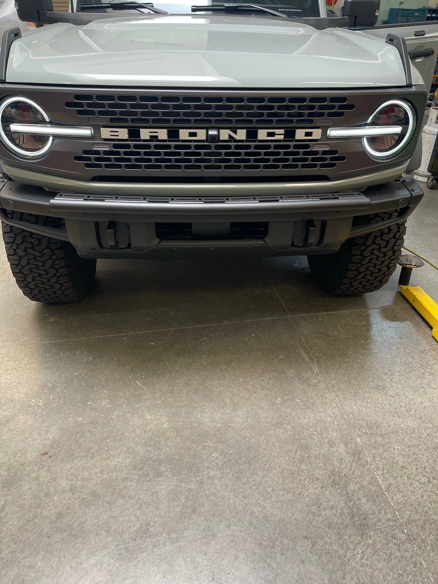 6th Gen Bronco Front Light Mount Kit installed on a modular stock front bumper, showcasing versatility for any light.