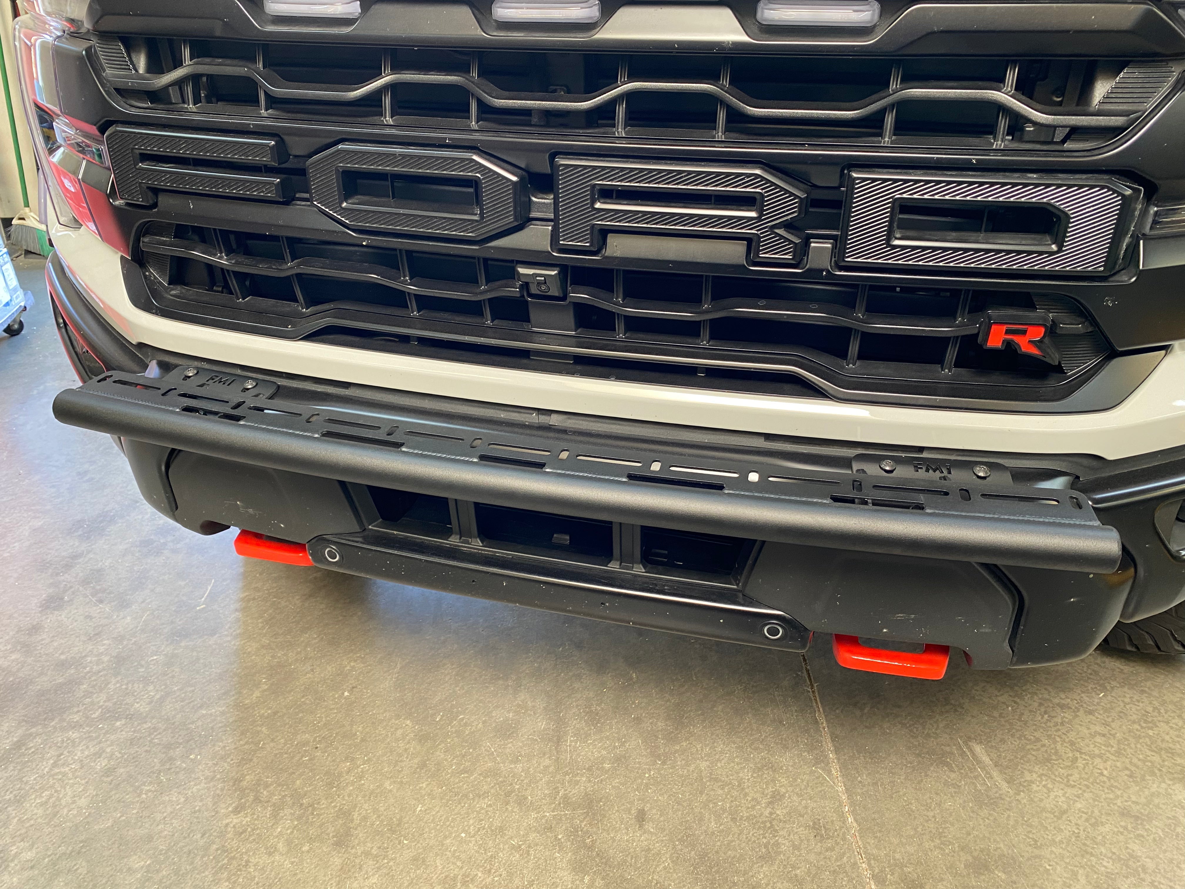 2024 Raptor front light mount kit for modular bumper, compatible with various light types, showcasing robust design.