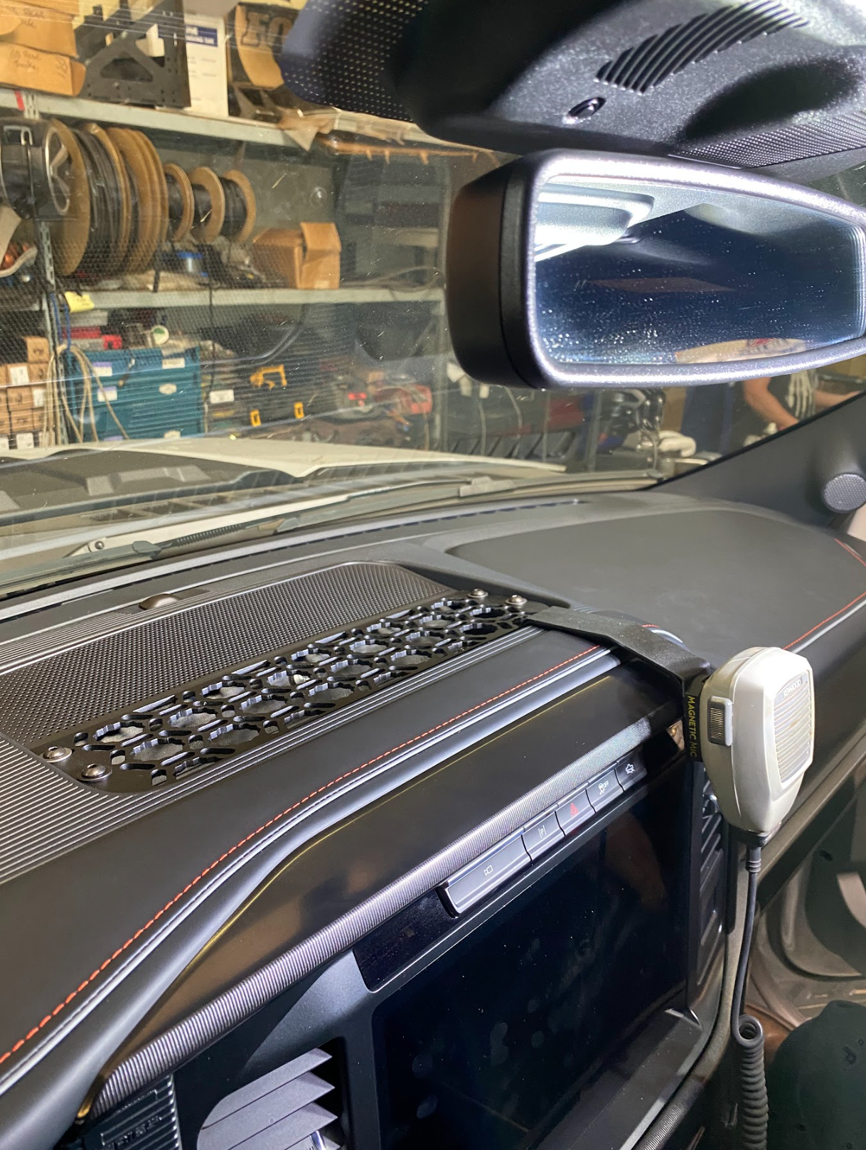 2024 F150 Raptor center dash mount kit by Adapt-A-Panel installed, showcasing sleek design and functionality.