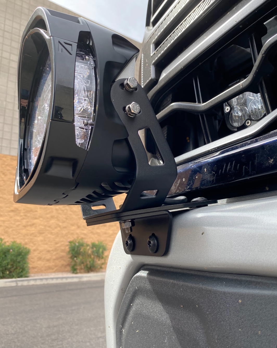 Light mount brackets for 2024+ Gen 3.5 Raptor, designed for stock bumpers, securely holding offroad lights.