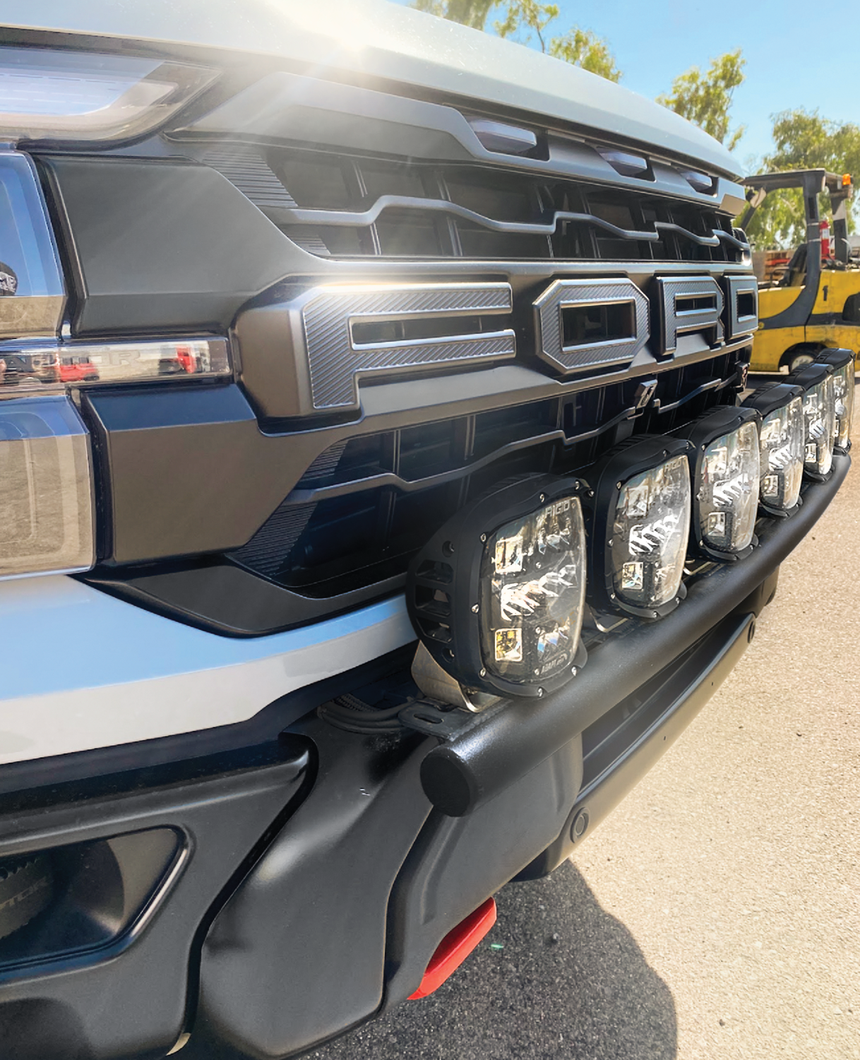 2024 Raptor Front Light Mount Kit for modular bumpers, showcasing versatile light mounting options on a truck.