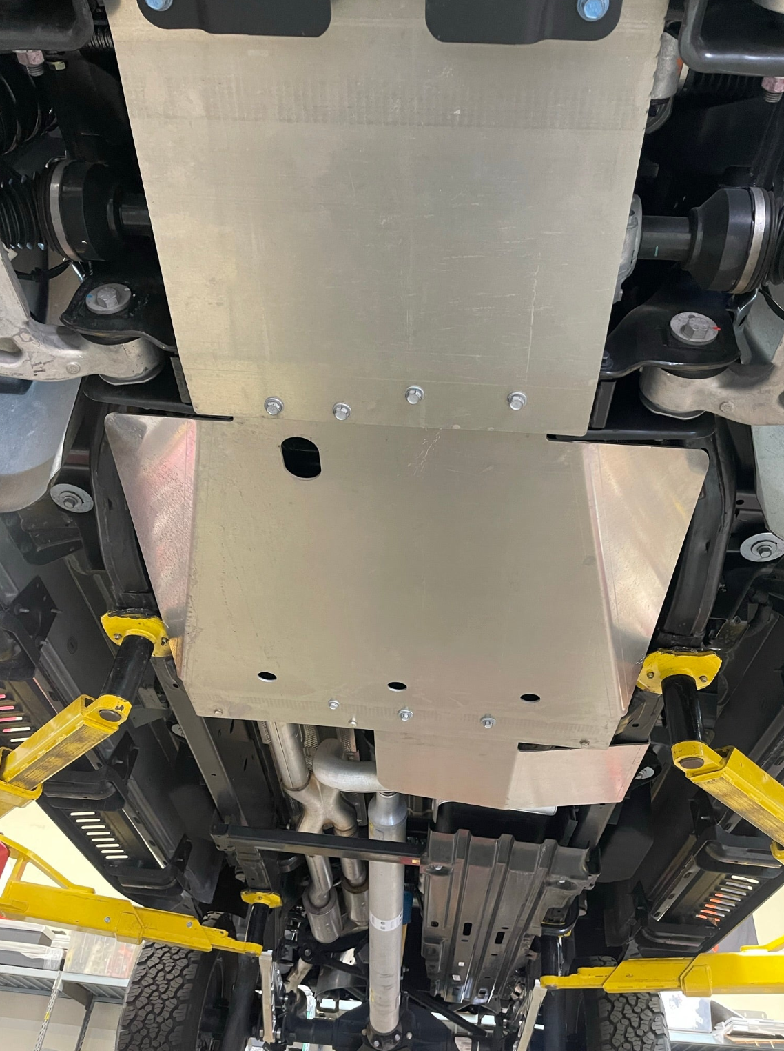 Underbody protection skid plate kit installed on a 2025 Ram RHO, showcasing durable aluminum construction for offroad safety.