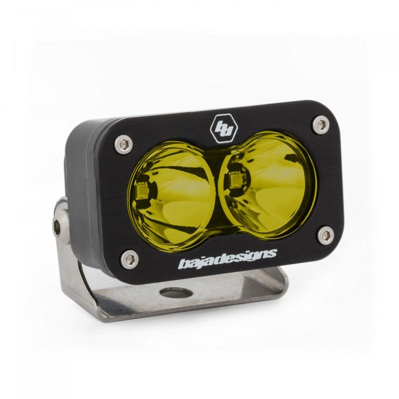 Baja Designs S2 Sport amber LED work light with dual lenses and a sturdy mounting bracket for offroad applications.