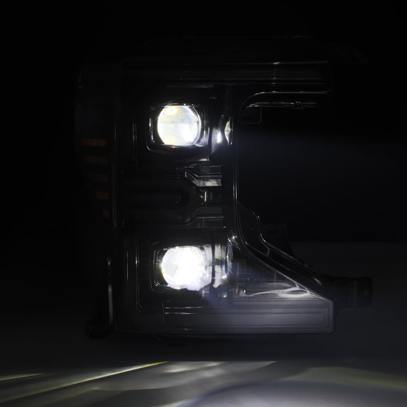AlphaRex LUXX-Series LED projector headlights for 20-22 Ford F-250/350/450, featuring a sleek black design and advanced lighting.