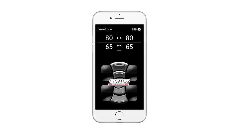 Air Lift 3P System 1/4" Air Line display showing air pressure settings for vehicle suspension adjustment.
