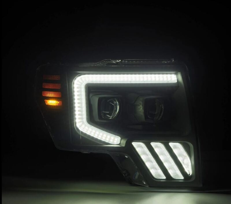 AlphaRex PRO-Series projector headlights for 09-14 Ford F-150, featuring black housing and sequential signal lights.