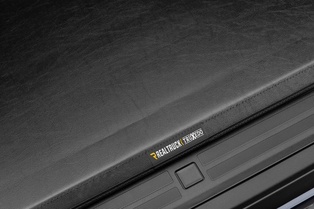 TruXport Tonneau Cover Black 2015-2025 Ford F-150 6 Foot 7 Inch Bed Truxedo