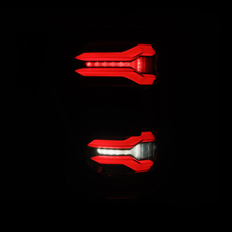 AlphaRex LUXX LED taillights for 21-23 Ford F-150 in alpha-black with BLIS feature, showcasing a sleek design.