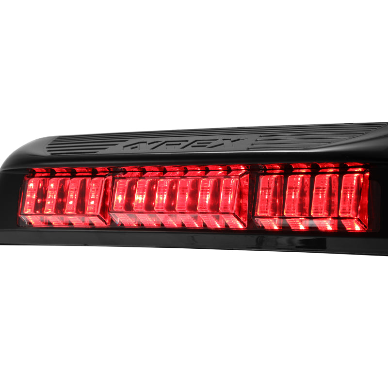 AlphaRex LUXX-Series LED 3rd brake light for 2016-2023 Toyota Tacoma in black, featuring bright red LED lights.