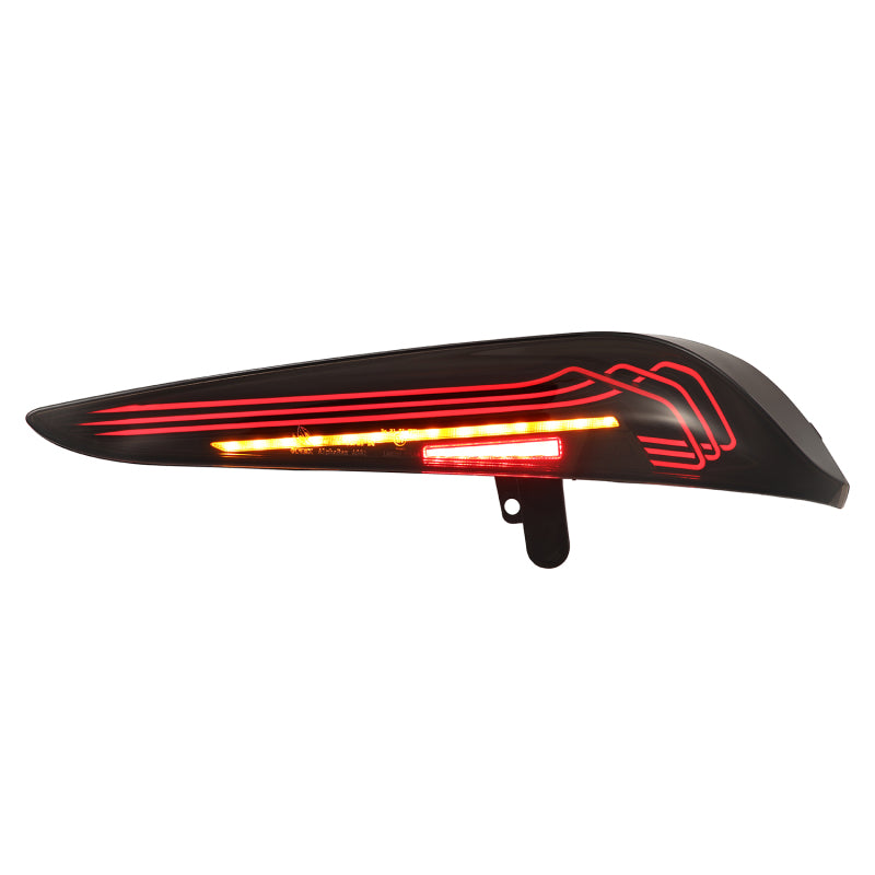 AlphaRex LUXX-Series LED tail light for 20-24 Toyota Supra in alpha-black finish, featuring a sleek laser style design.