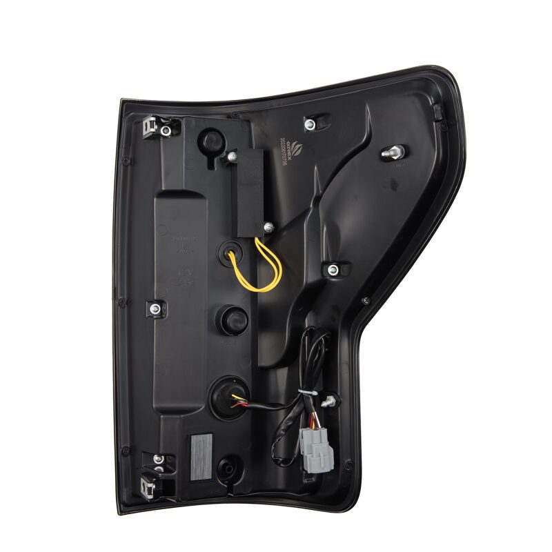 AlphaRex LUXX-Series LED tail light for 2007-2013 Toyota Tundra in alpha-black finish, showcasing rear view and wiring.