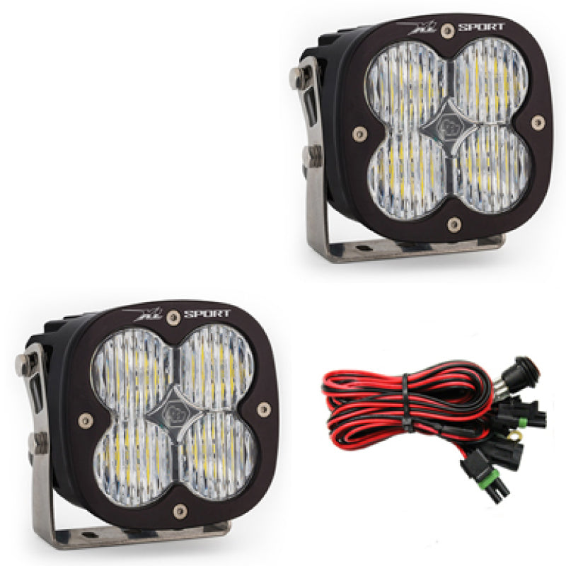 Baja Designs XL Sport Series LED light pods with wide cornering pattern, featuring durable housing and wiring harness.