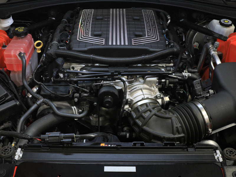 aFe 14-25 Chevrolet Corvette V8 6.2L 95mm throttle body installed in a Corvette engine bay, showcasing performance upgrades.