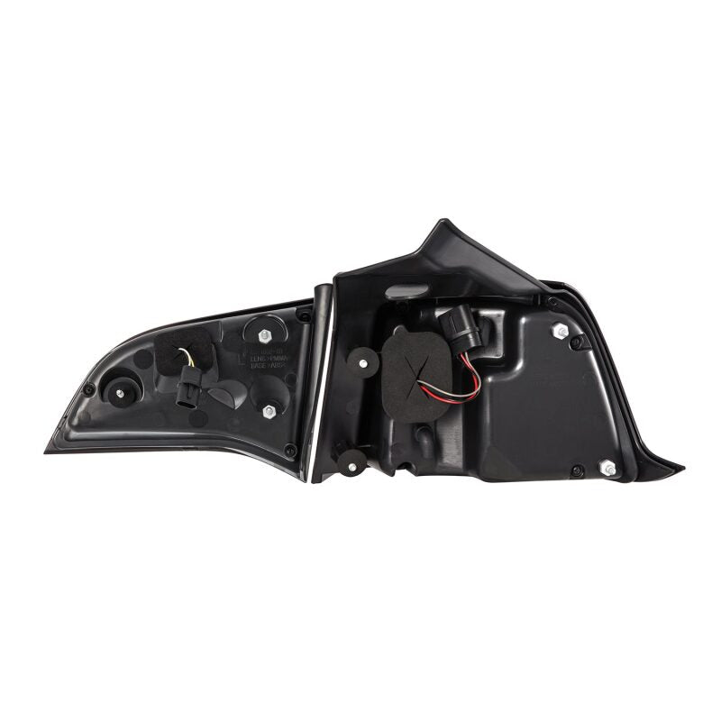 AlphaRex PRO-Series LED tail lights for 2017-2022 Tesla Model 3 in red smoke with sequential signals.