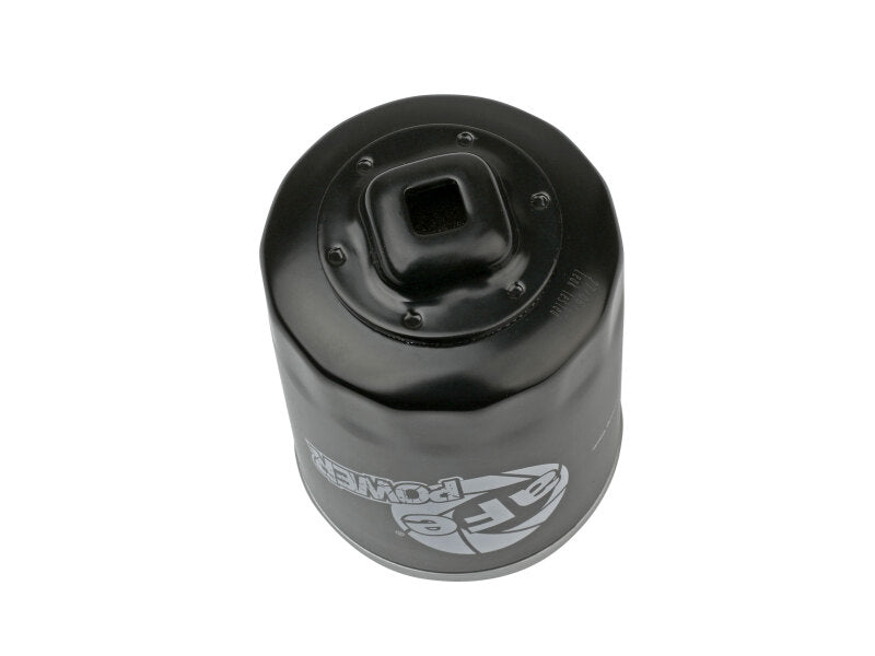Afe PROGUARD oil filter featuring a black exterior with the Afe logo, designed for high-performance vehicles.