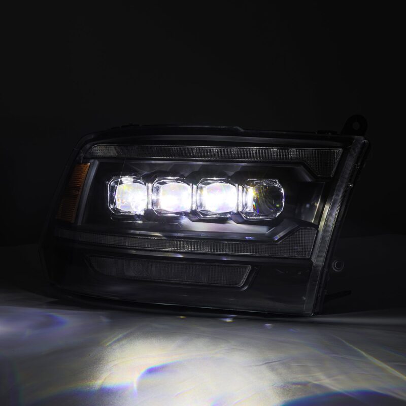AlphaRex NOVA LED projector headlights for 09-18 Dodge Ram 2500 in black with plank style design and activation light.