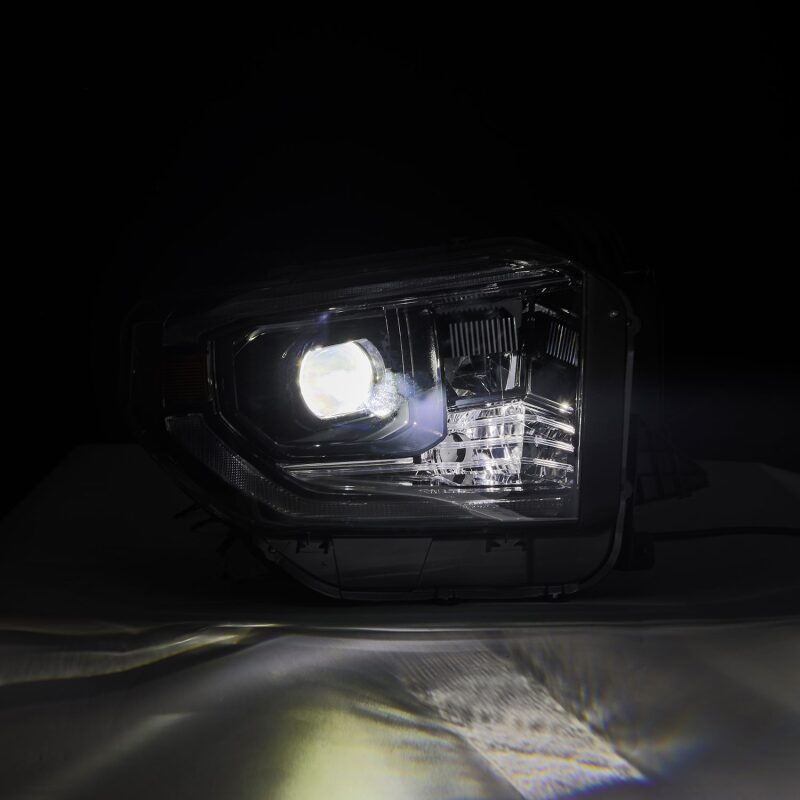 AlphaRex LUXX-Series LED projector headlights for 14-21 Toyota Tundra with active light and sequential signals.