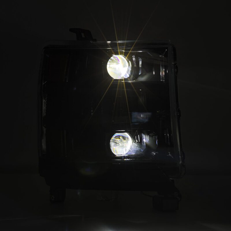 AlphaRex LUXX LED projector headlights for 2016-2018 Chevy 1500HD, featuring sequential turn signals and ATV lights.