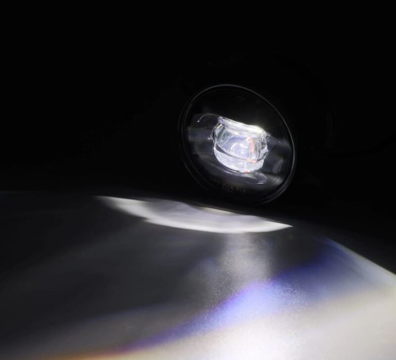 AlphaRex DoubleTap dual color LED fog light projecting white light, designed for Chrysler, Dodge, Hummer, and Jeep vehicles.