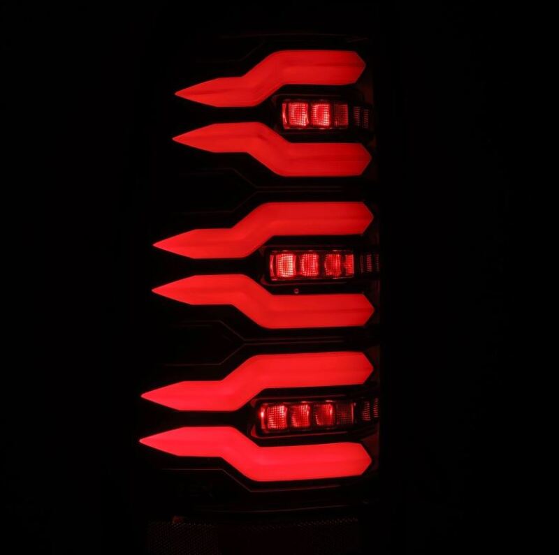 AlphaRex LUXX-Series LED tail lights for 99-06 Chevrolet Silverado and Sierra in alpha-black finish, showcasing a sleek design.