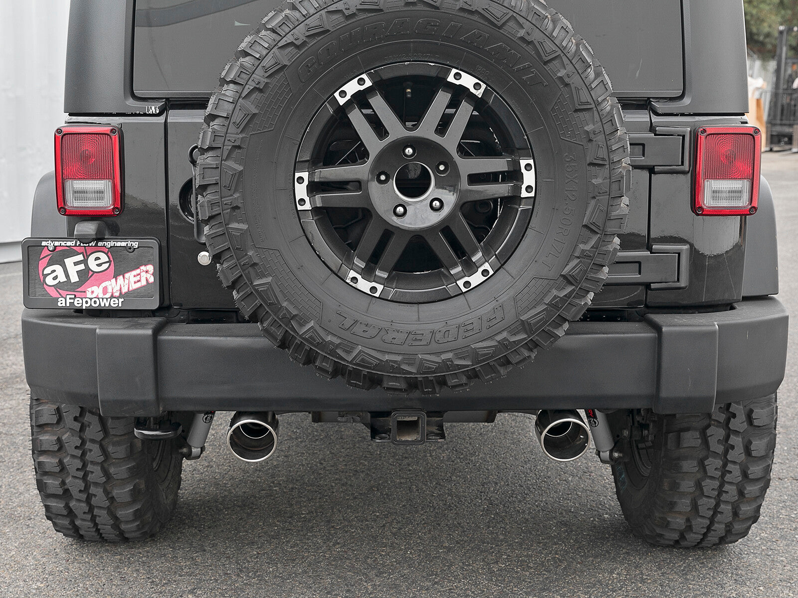 Rebel Series 2-1/2 Inch 409 Stainless Steel Axle-Back Exhaust w/ Polished Tips Jeep Wrangler (JK) 07-18 V6-3.6L/3.8L aFe Power